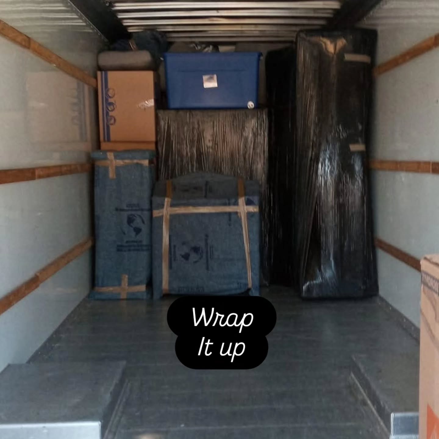 Furniture wrapped and secured in the truck